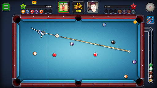 8 Ball Pool screenshot showing a cue aiming line on the table